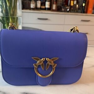 Elegant Blue Bag with Gold Accents